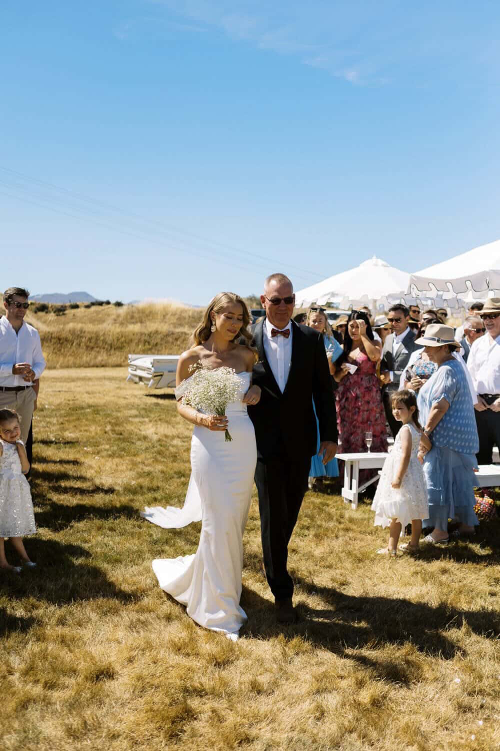 Bride walking down the aisle with her father